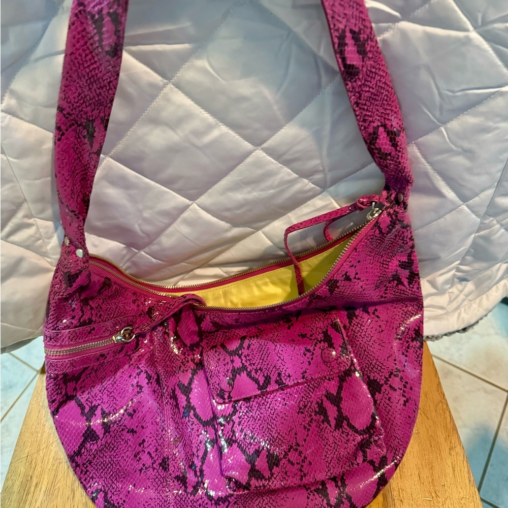 Latico pink leather snake hobo